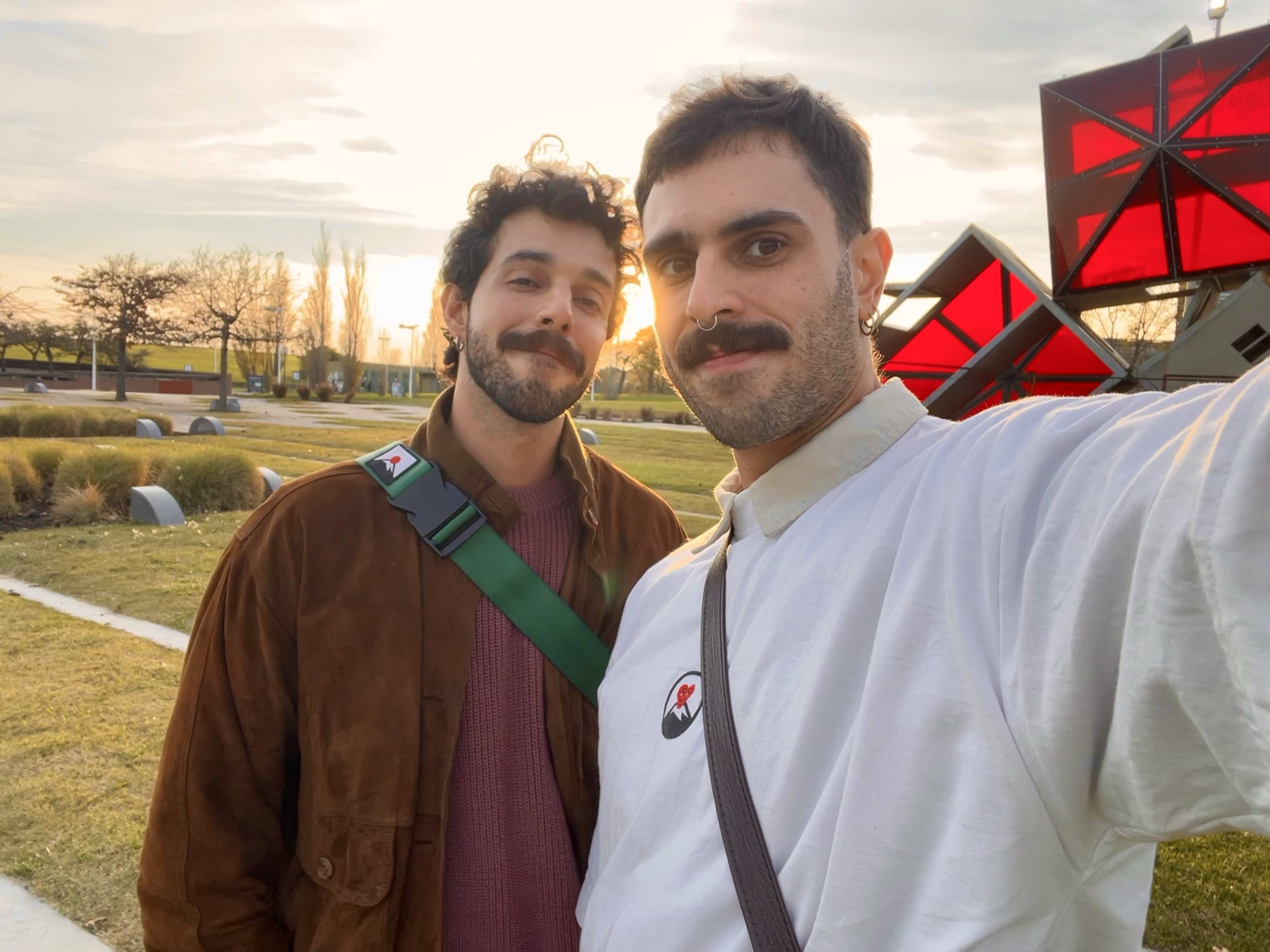 A sunset selfie of two men